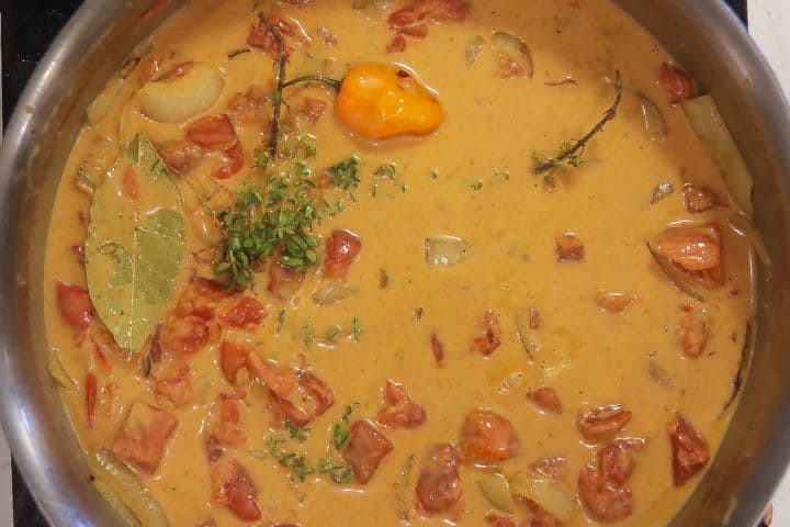 curry sauce cooking in skillet