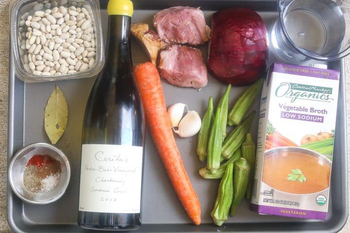 ingredients for beans and ham on a tray
