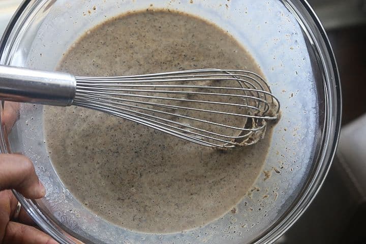 stirring marinade in a bowl