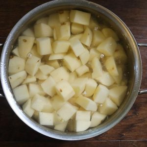 potatoes boiling in a pot