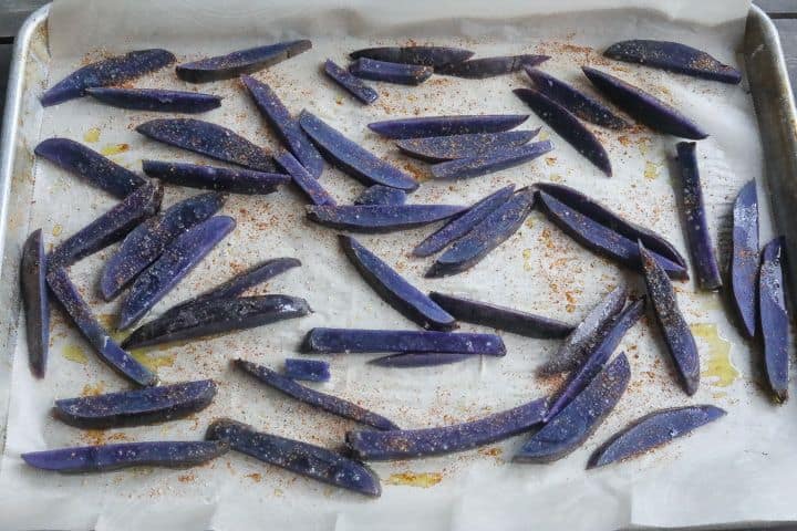 fries seasoned on a tray