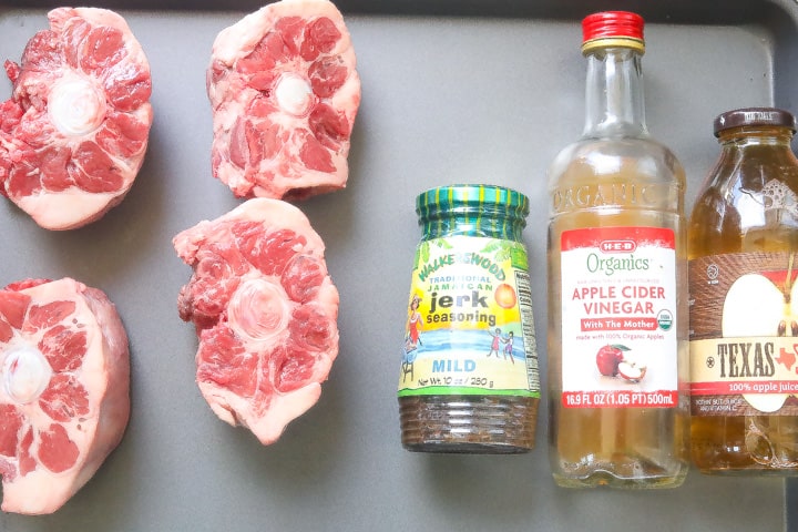 jerk oxtail ingredients on a tray