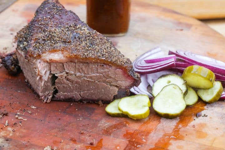 smoked brisket on a cutting board