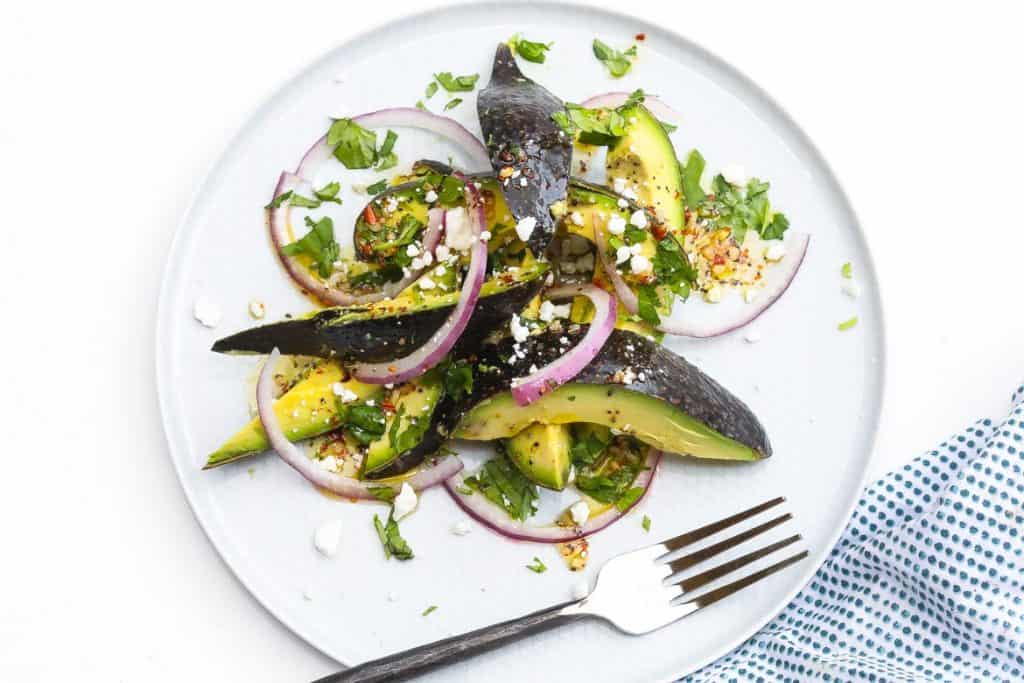 avocado salad on white plate
