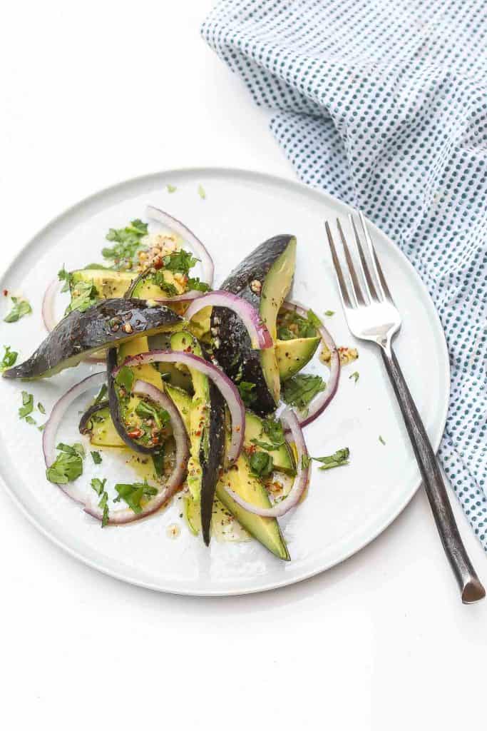 avocado salad on white plate