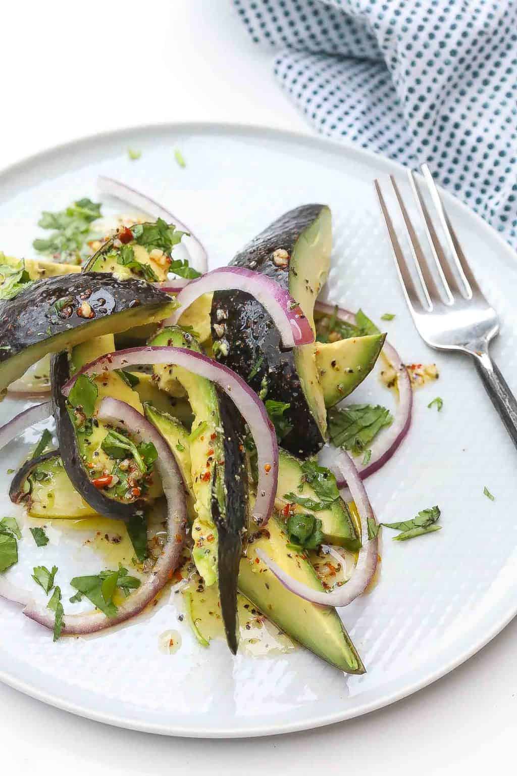 avocado salad on white plate