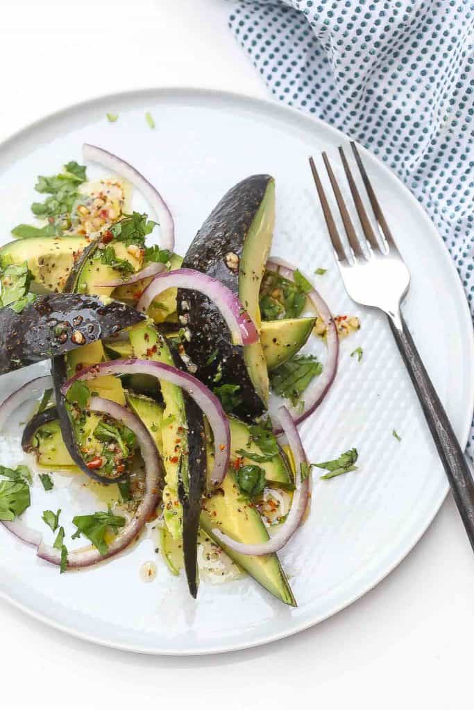 avocado salad on white plate