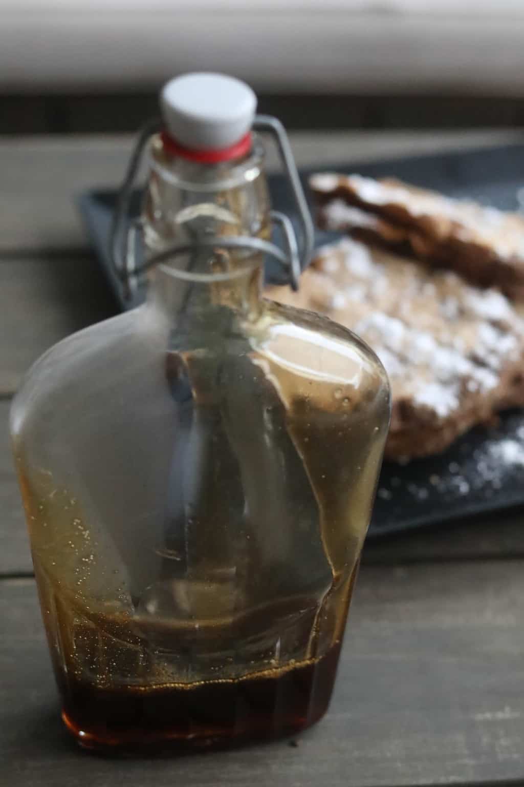 homemade syrup in a glass bottle