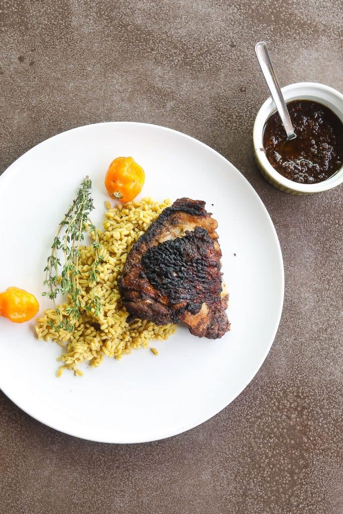 jerk chicken on a white plate