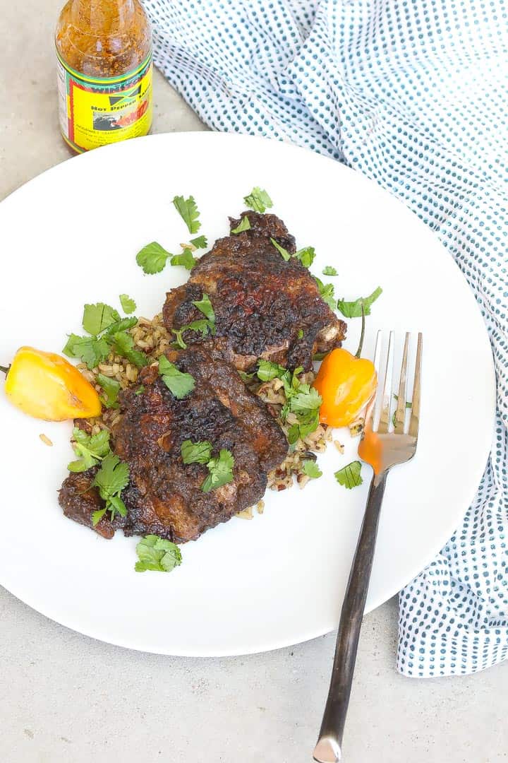 jerk chicken on a white plate