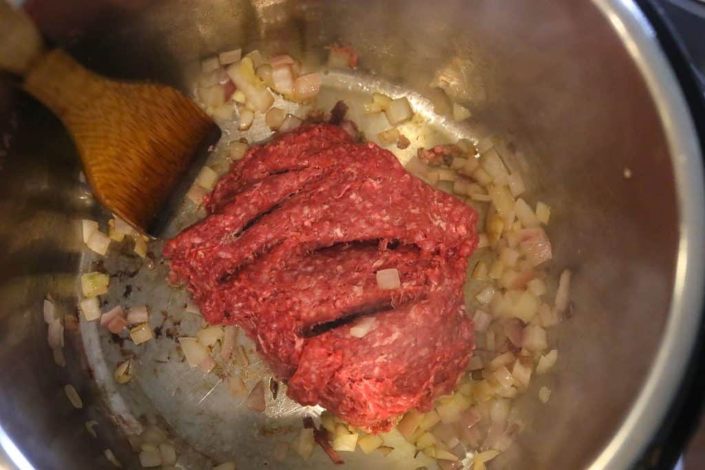 ground beef added to vegetable saute