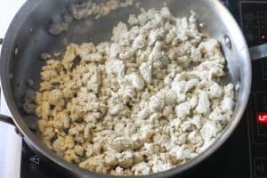 ground turkey cooking in a skillet