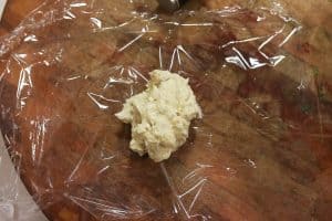 dollop of butter on saran wrap