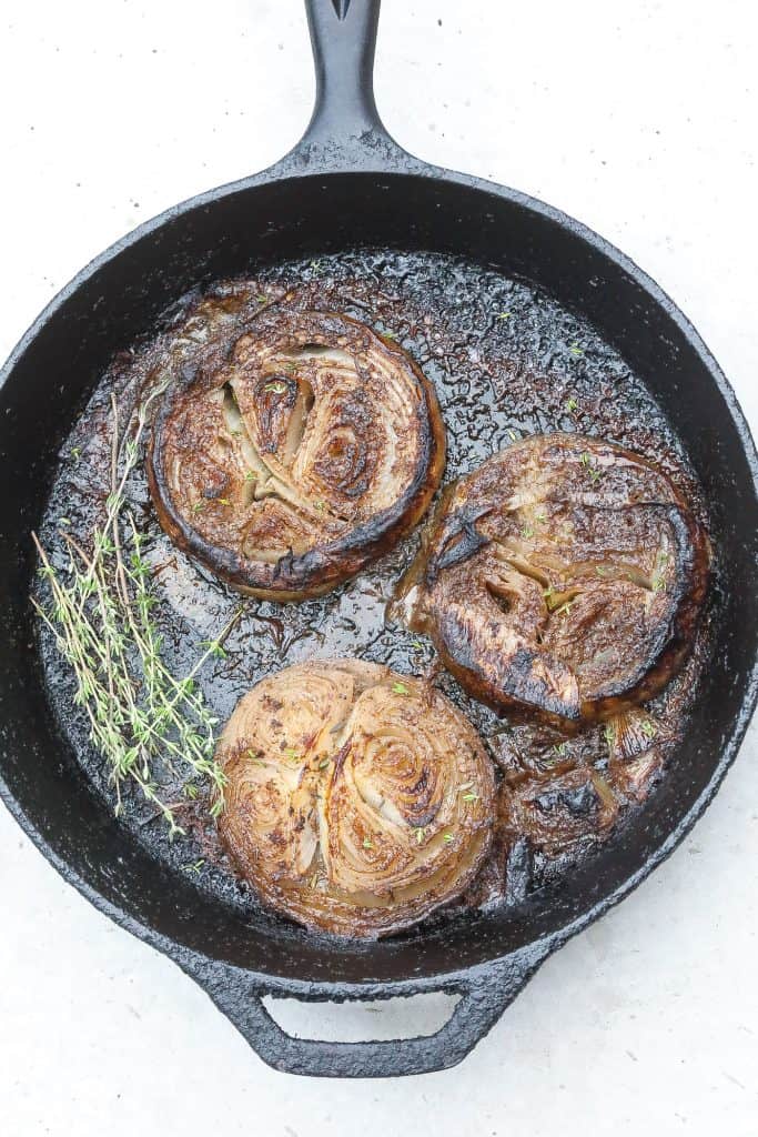 roasted onions in a skillet