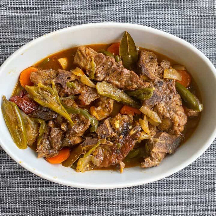 braised neck bones on a white plate