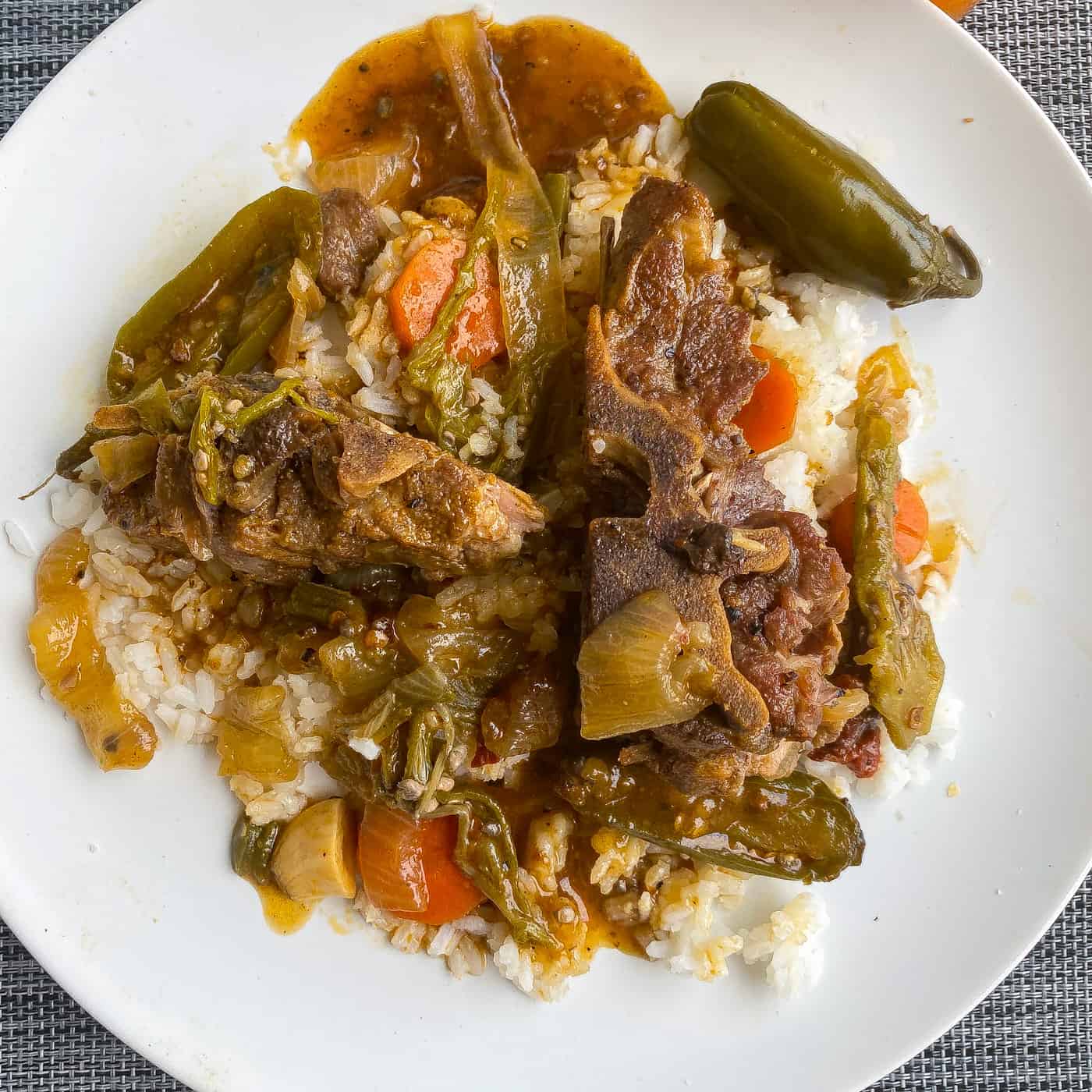 braised neck bones on a white plate