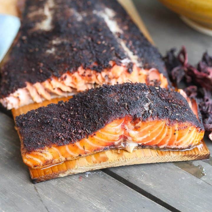 cedar plank grilled salmon on a table