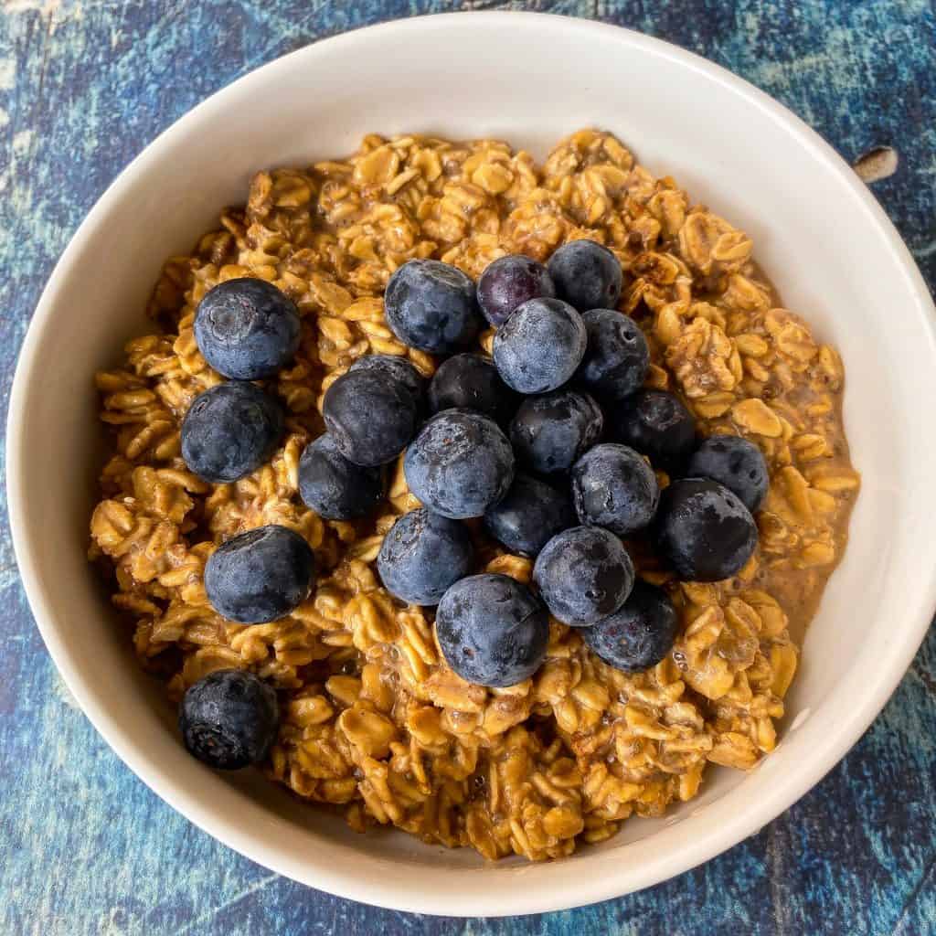 oatmeal with blueberries in a white bowl