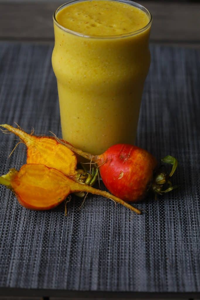 smoothie in a glass with golden beets