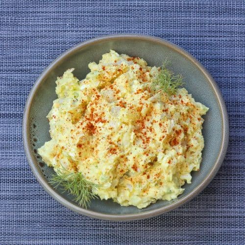 potato salad in green bowl