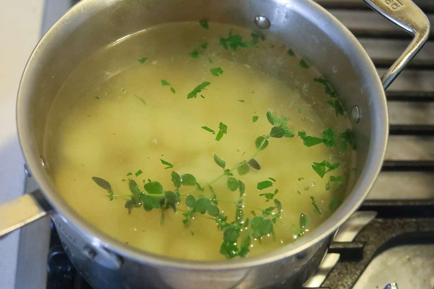 potatoes boiling in pan