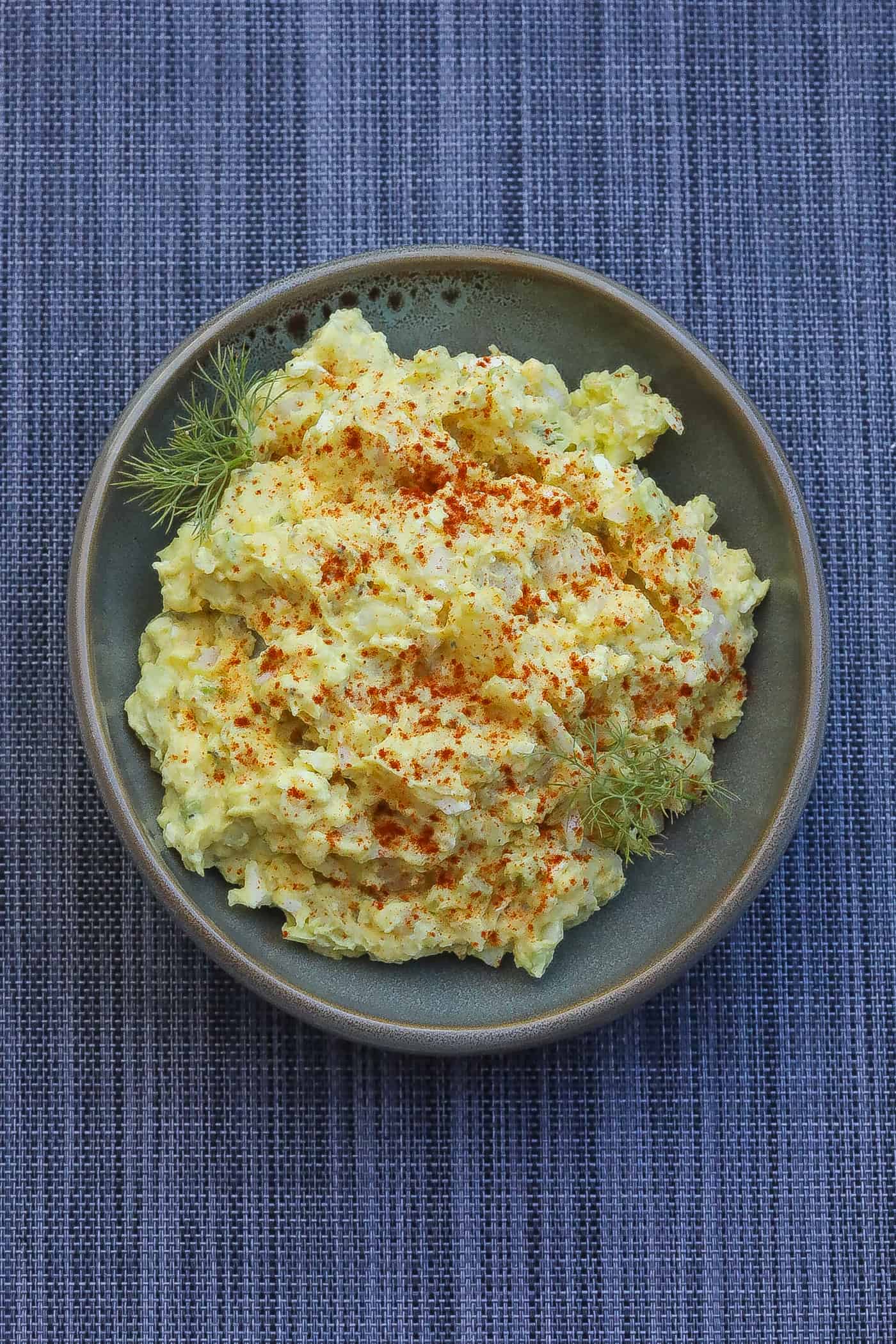 potato salad in green bowl