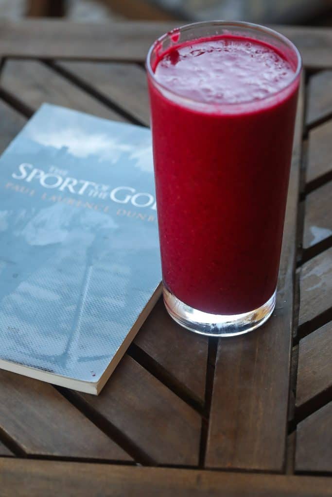 raspberry smoothie on a table