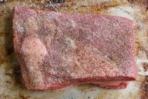 beef brisket seasoned with salt and pepper