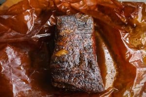 smoked brisket on a cutting board