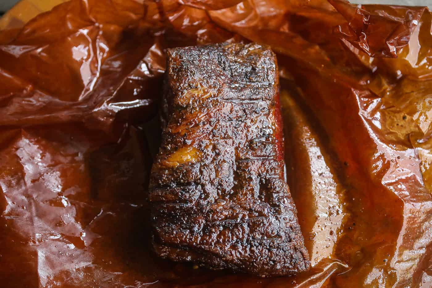 smoked brisket on a cutting board