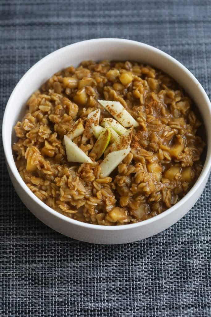 apple cinnamon oatmeal in white bowl