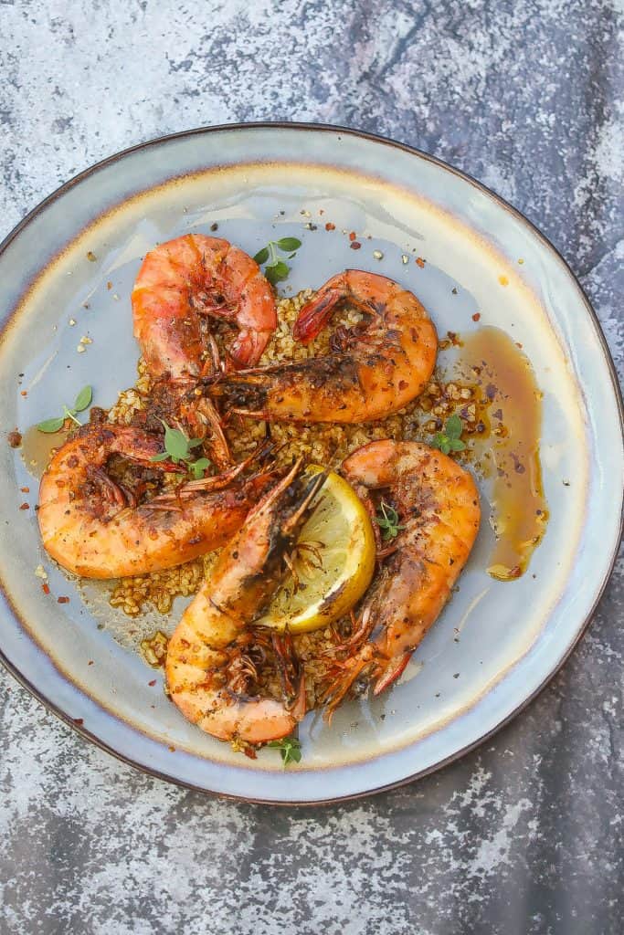 grilled prawns topped with lemon butter sauce