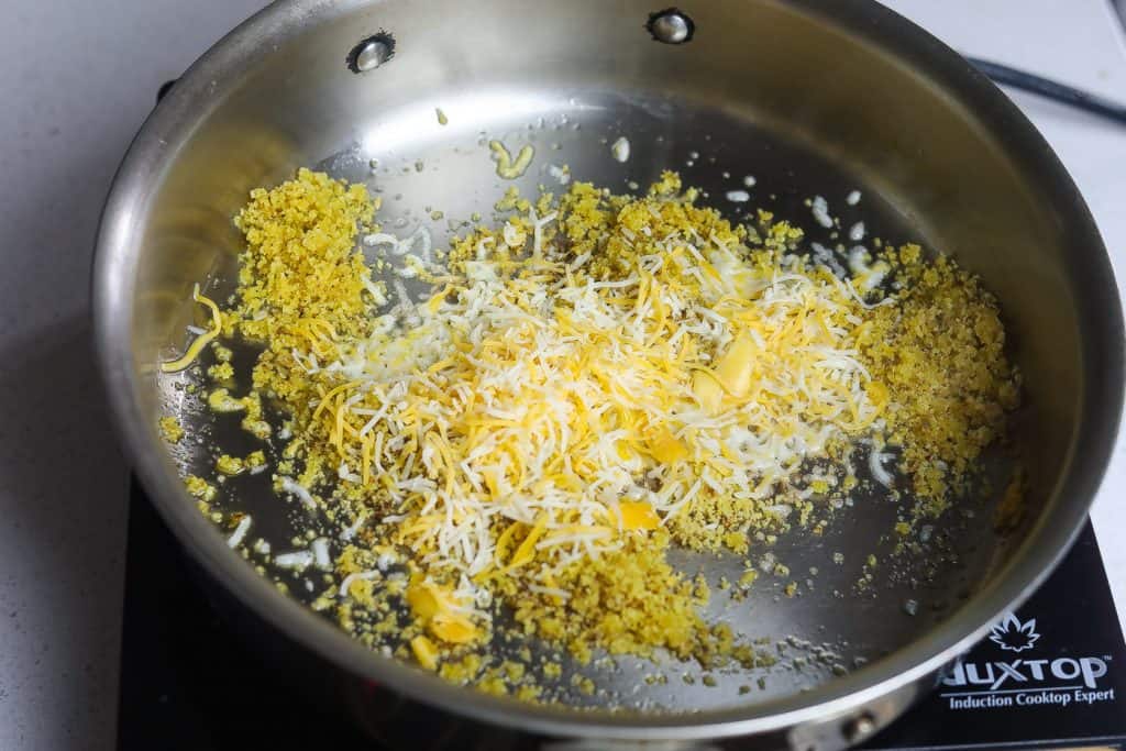 cheese and bread crumbs in skillet