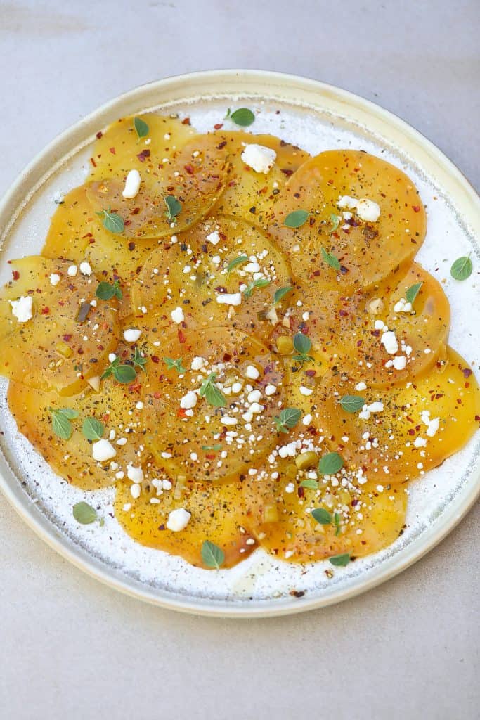 golden beets topped with herbs, spices and goat cheese