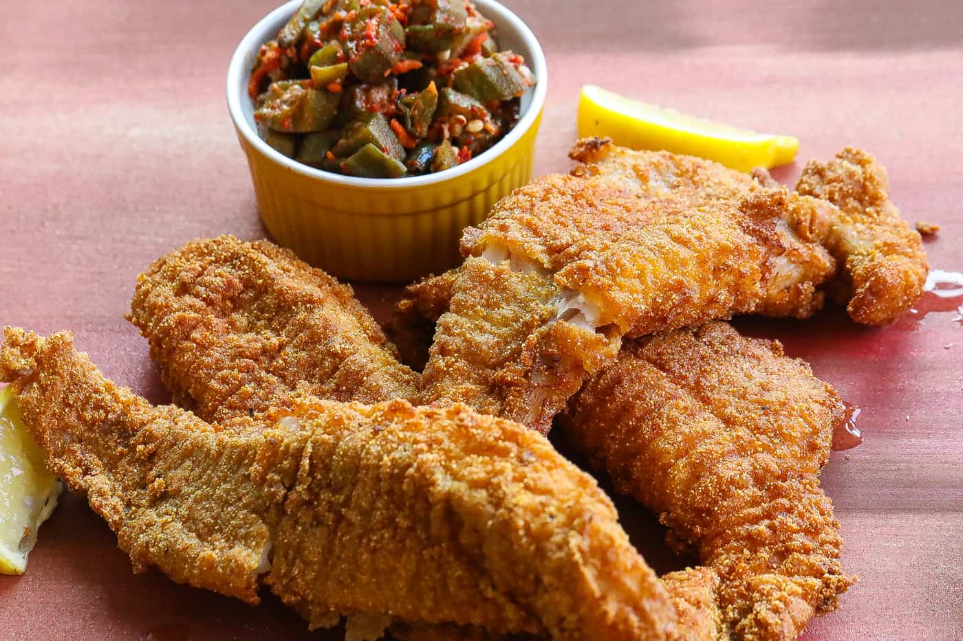 southern fried catfish on a red table
