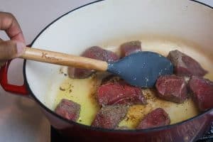 beef cooking in pot
