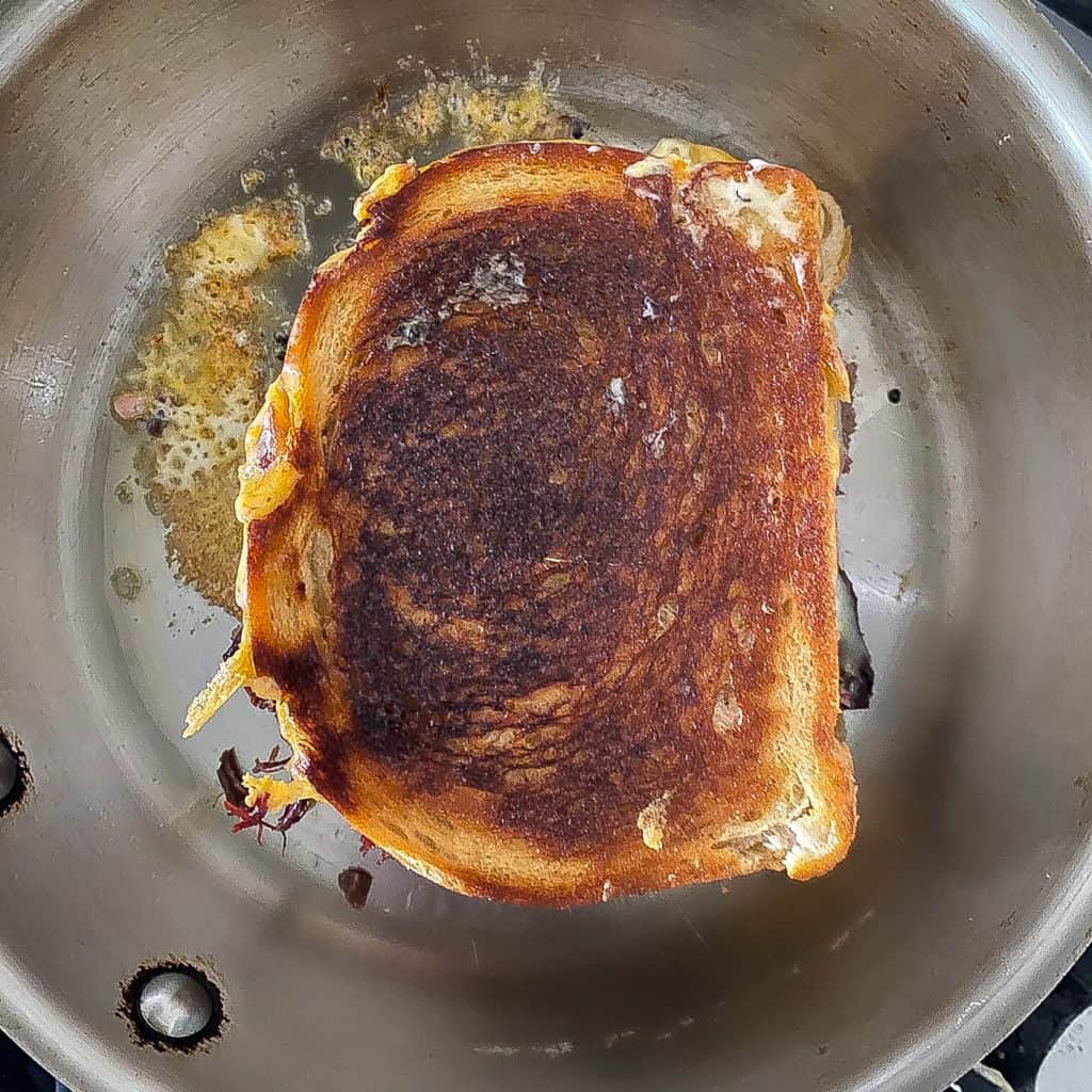 grilled cheese sandwich in skillet