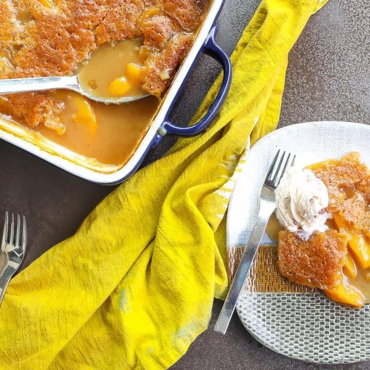 peach cobbler on a tri-color plate