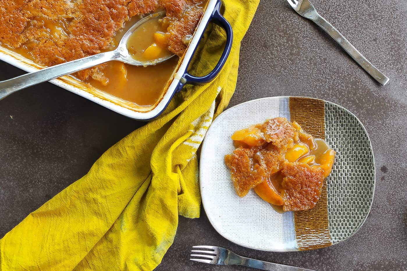 peach cobbler on a tri-color plate