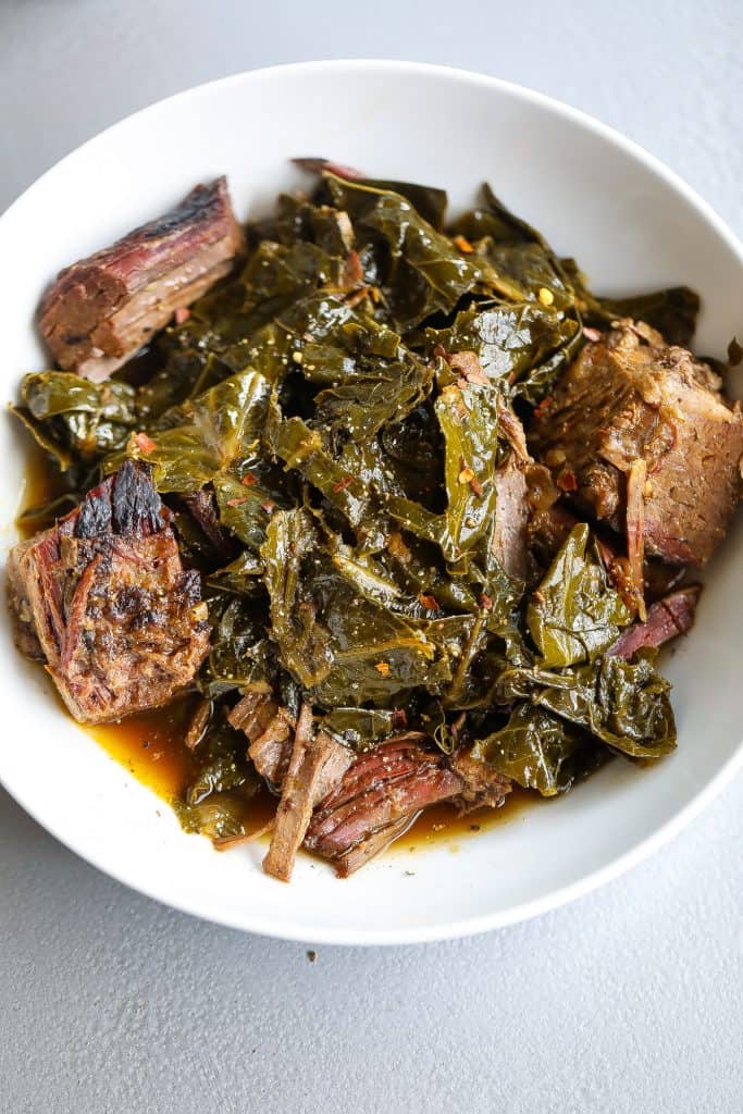 collard greens with brisket in bowl