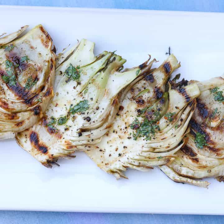 grilled fennel on a white plate