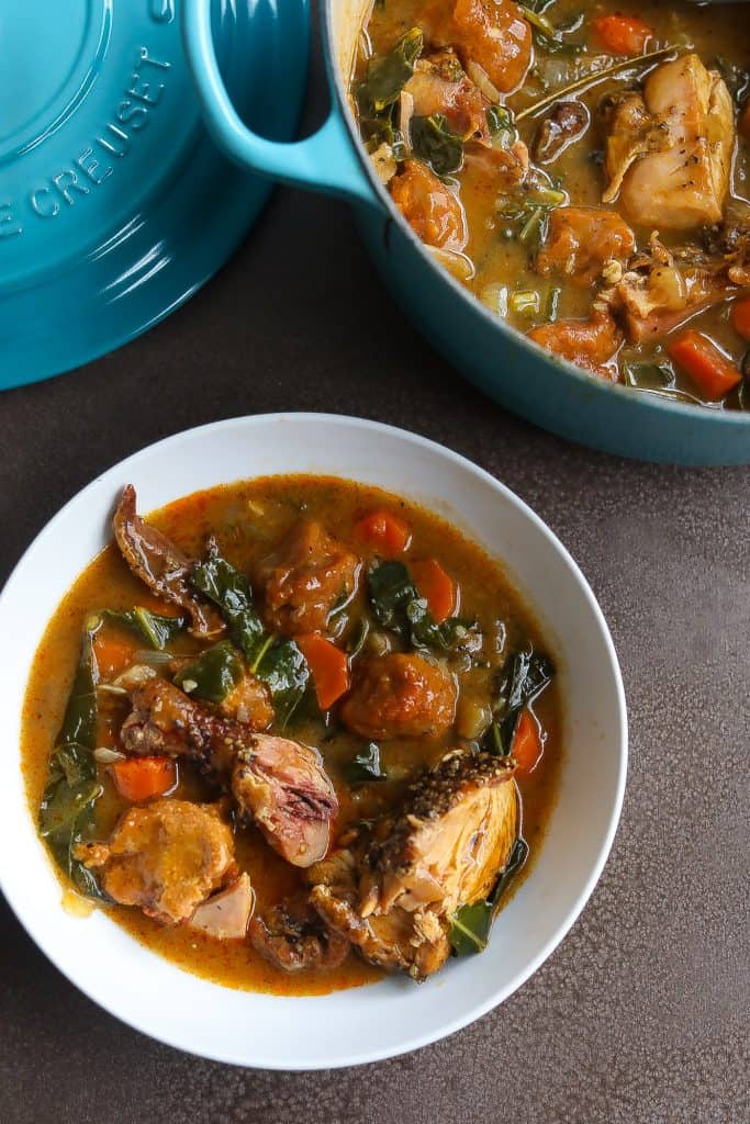 chicken and dumplings in a white bowl