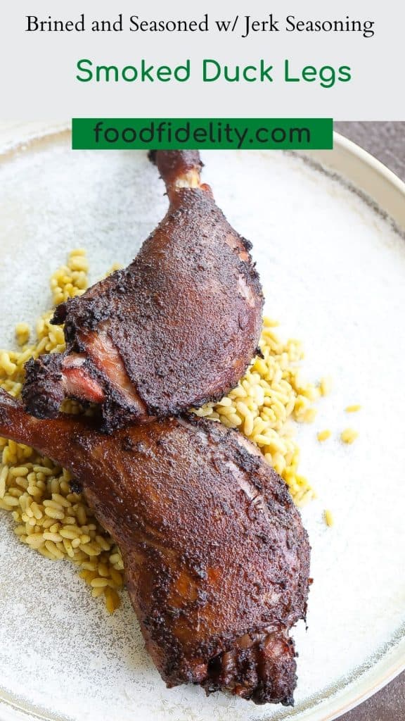 smoked duck on a tan plate with rice