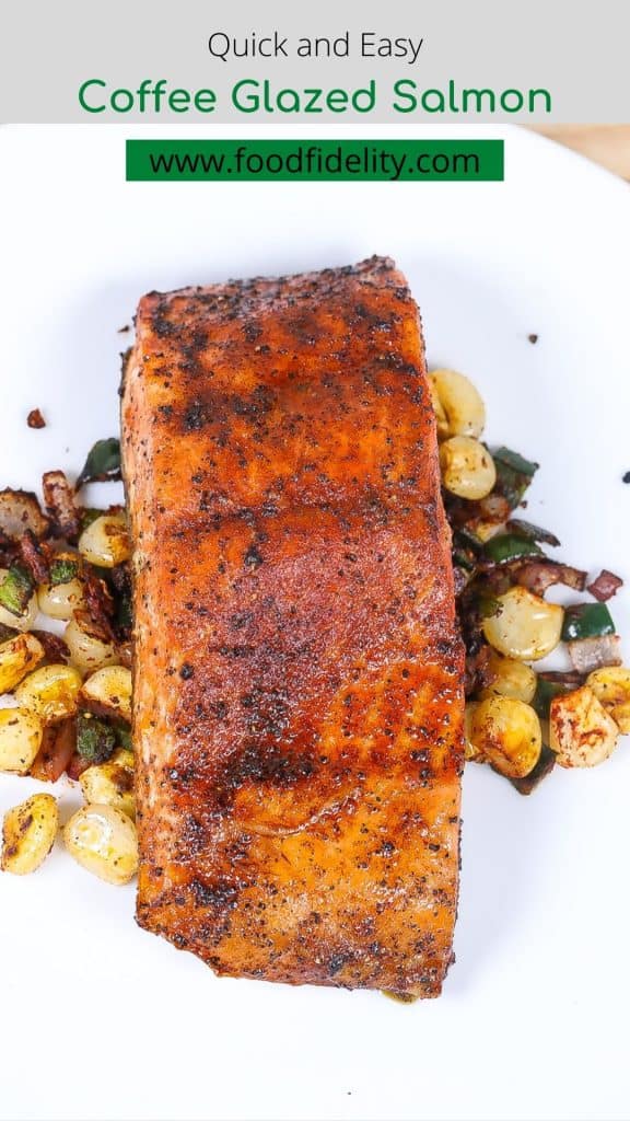 broiled salmon with corn on a white plate