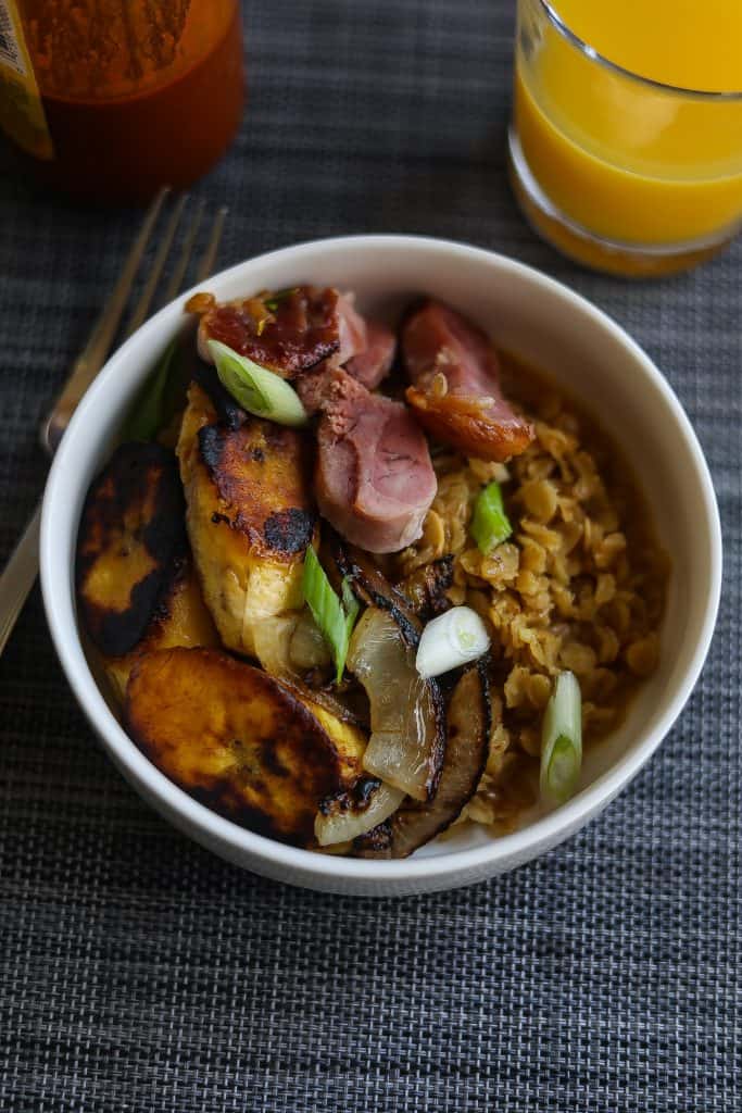 savory oatmeal topped with plantains, ham, and onions