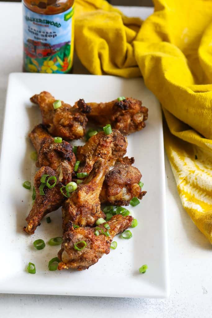 jerk wings on white rectangular plate