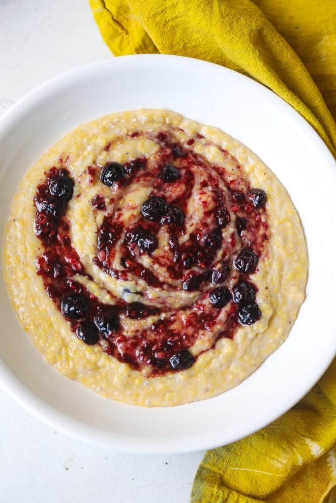 yellow grits topped with berry compote