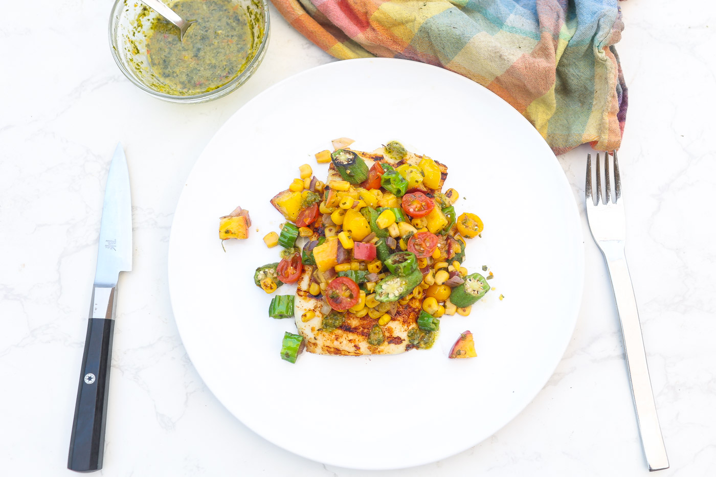 grilled calamari topped with okra and corn salsa