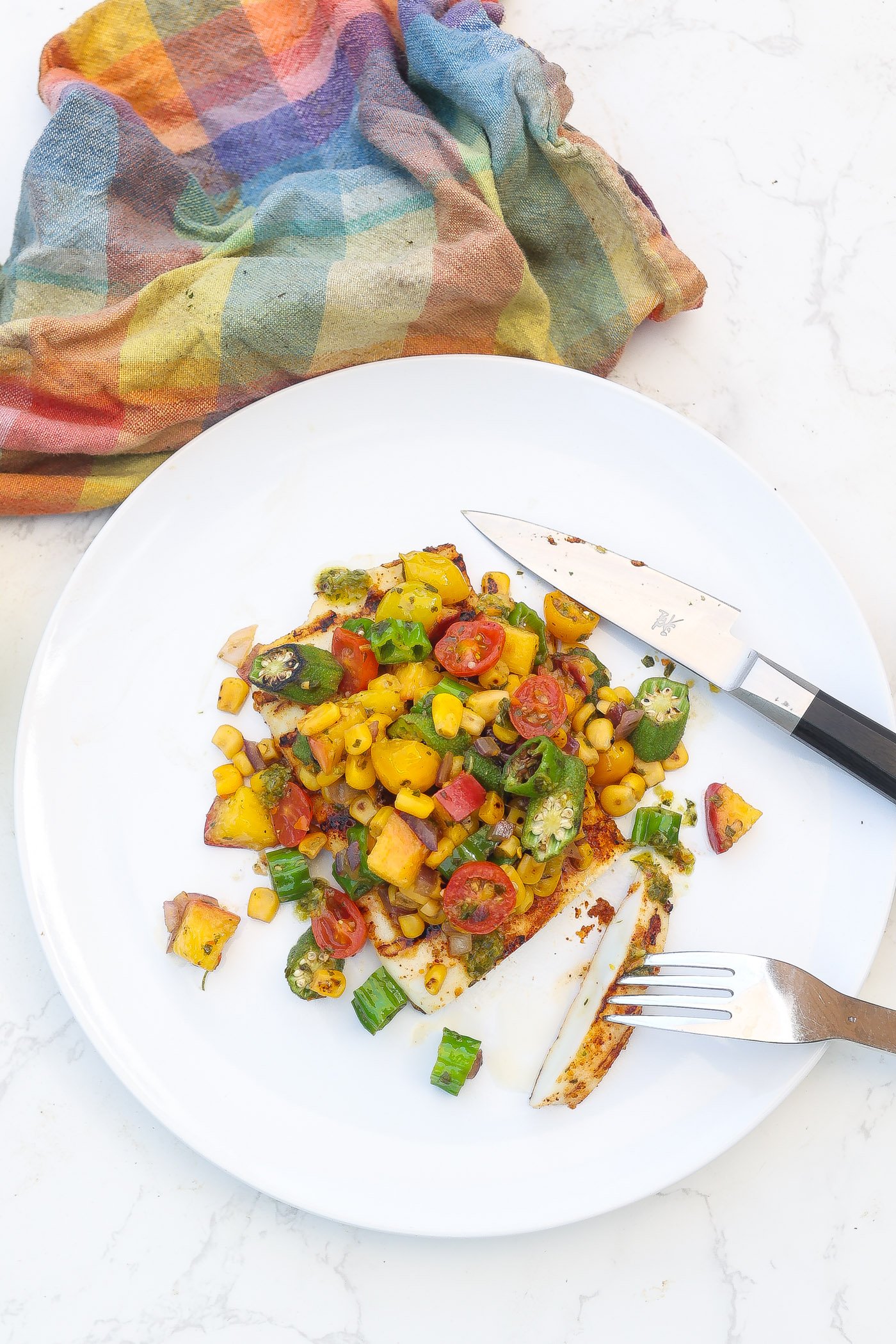 grilled calamari topped with okra and corn salsa