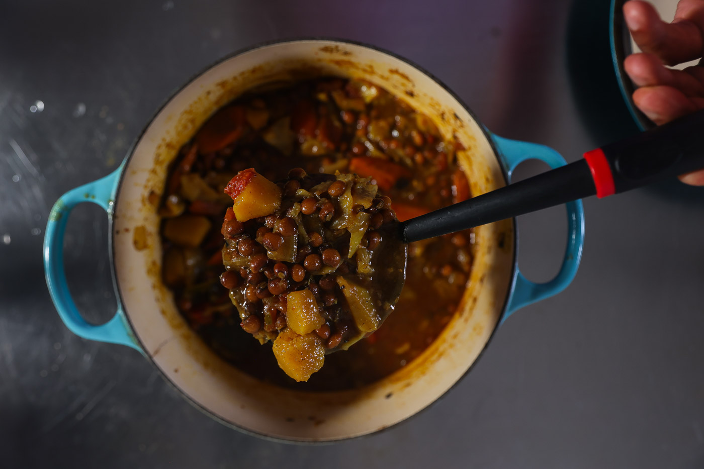 pigeon pea stew in a blue pot